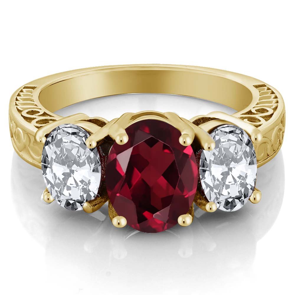 Gem Stone King 18K Yellow Gold Plated Silver Oval Red Rhodolite Garnet 3-Stone Ring For Women (5.00 Cttw, Gemstone Birthstone, Available In Size 5, 6, 7, 8, 9)