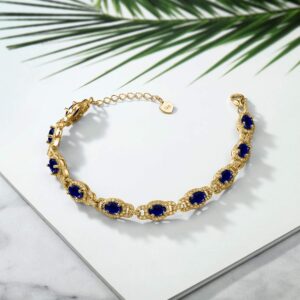 Gem Stone King 18K Yellow Gold Plated Silver Oval Blue Sapphire Tennis Bracelet For Women (9.71 Cttw, 7 Inch, With 1 Inch Extender)