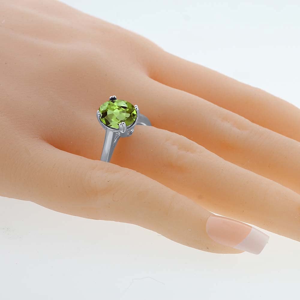 Gem Stone King 925 Sterling Silver Green Peridot and Black Diamond Solitaire Ring For Women (3.03 Cttw, Oval 11X9MM, Gemstone Birthstone, Available In Size 5, 6, 7, 8, 9)