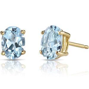 peora solid 14k yellow gold aquamarine earrings for women, genuine gemstone birthstone solitaire studs, hypoallergenic 7x5mm oval shape, 1.25 carats total, friction back