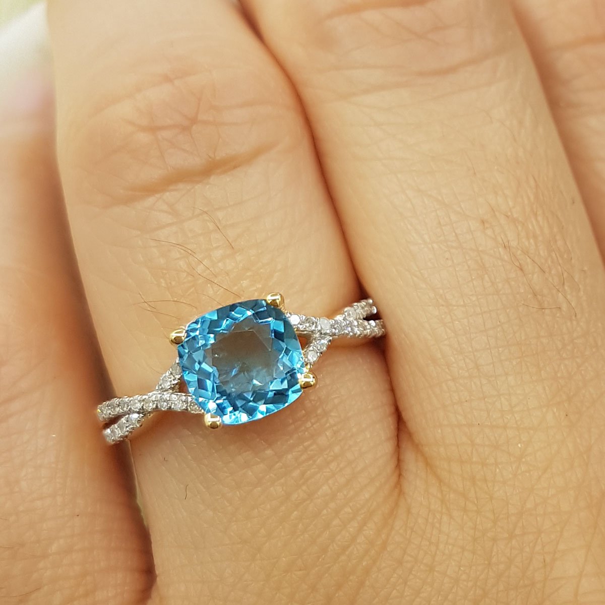 Dazzlingrock Collection 7MM Cushion Blue Topaz & Round White Diamond Swirl Crisscross Split Shank Engagement Ring for Women | 14K Yellow Gold, Size 7.5