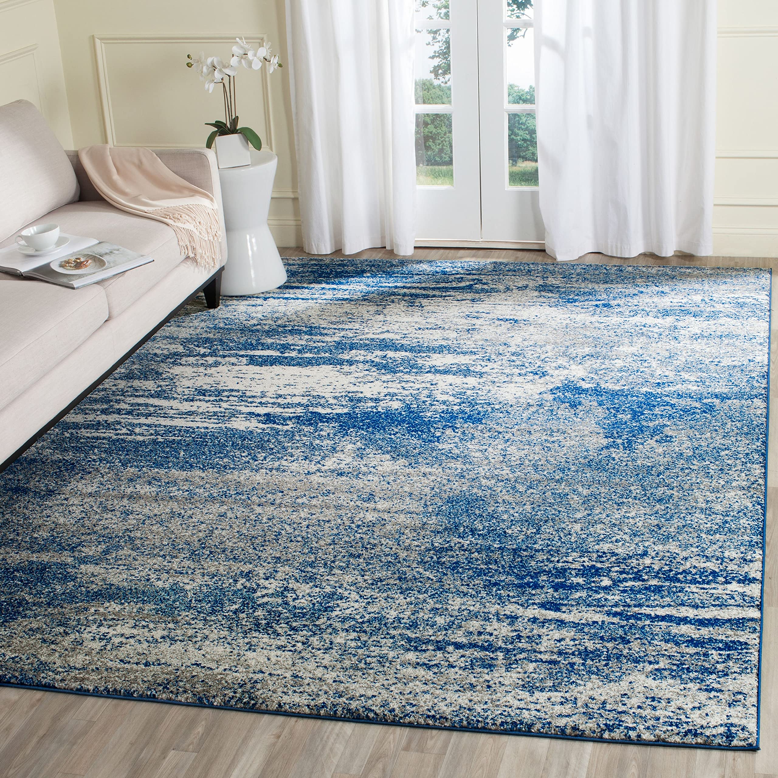 SAFAVIEH Evoke Collection Area Rug - 8' x 10', Navy & Ivory, Modern Abstract Design, Non-Shedding & Easy Care, Ideal for High Traffic Areas in Living Room, Bedroom (EVK272A)