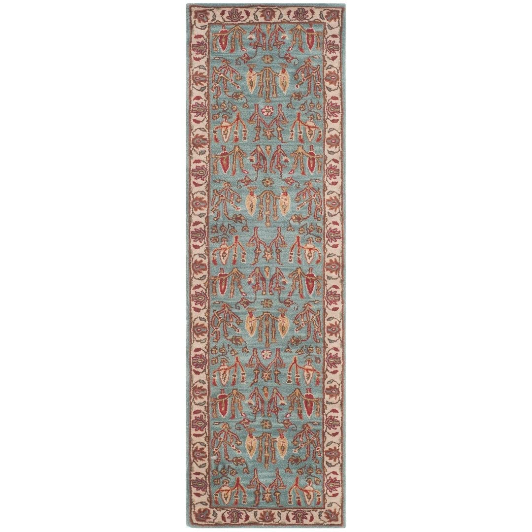 SAFAVIEH Heritage Collection Area Rug - 9' x 12', Blue & Ivory, Handmade Traditional Oriental Wool, Ideal for High Traffic Areas in Living Room, Bedroom (HG735A)