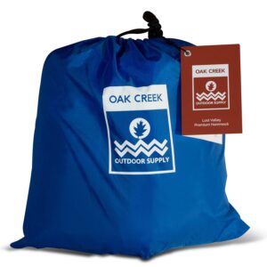 Oak Creek Lost Valley Camping Hammock. Bundle Includes Mosquito Net, Rain Fly, Tree Straps, Compression Sack. Weighs Four Pounds, Perfect for Camping. Lightweight Nylon Single Hammock.