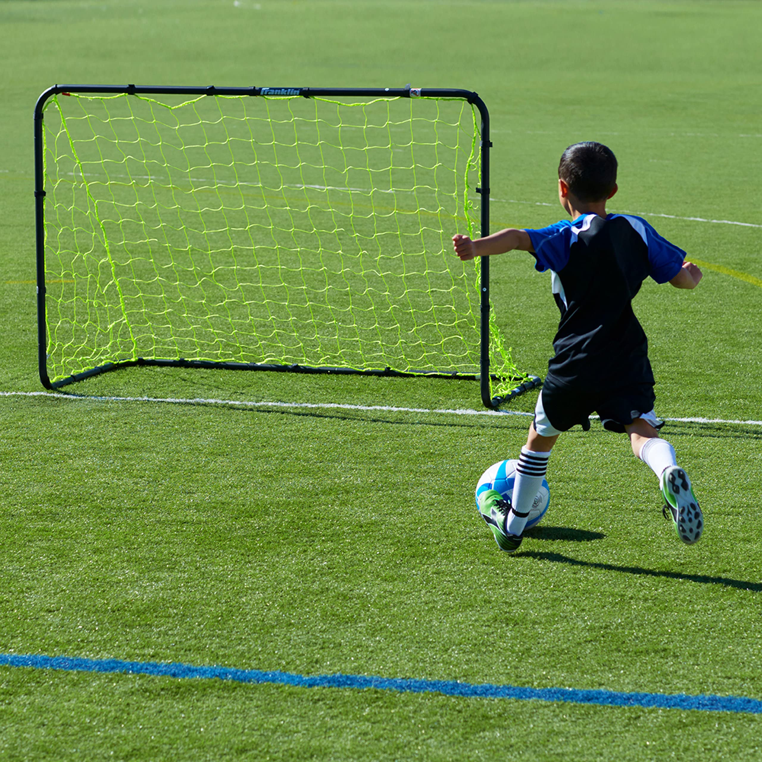 Franklin Sports Competition Soccer Goal - Steel Backyard Soccer Goal with All Weather Net - Includes 6 Ground Stakes - 6'x4' Soccer Goal - Black