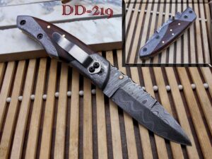 8" long folding knife with pocket clip, hand forged damascus steel 3.5" blade. rose wood scale with damascus bolster, cow hide leather sheath included with belt loop (walnut wood)