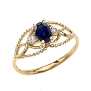 10k yellow gold elegant beaded solitaire ring with sapphire and white topaz(size 7)