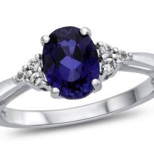 FJC Finejewelers 10k White Gold 8x6mm Oval Created Blue Sapphire and White Topaz Ring Size 7.5