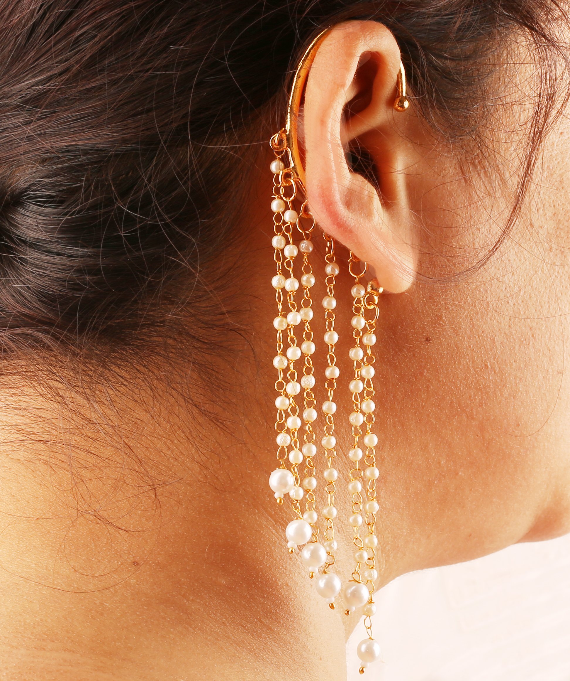 Touchstone Indian bollywood innovative ear shape lucrative look faux pearls hangings long bridal chandelier designer jewelry earrings for women in gold tone.