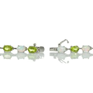 Ice Gems Sterlilng Silver Peridot and Created White Opal 7x5mm Oval-Cut Tennis Bracelet