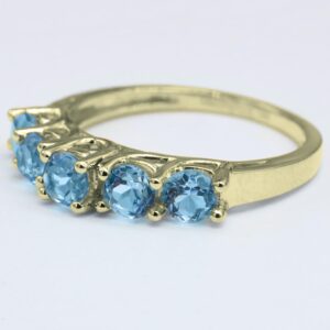 Dazzlingrock Collection 3.8mm Round Blue Topaz 5 Stone Style Wedding Ring Band for Women in 14K Yellow Gold, Size 7