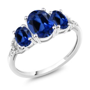 gem stone king 10k white gold oval blue created sapphire and diamond accent 3-stone women engagement ring (2.65 cttw) (size 5)