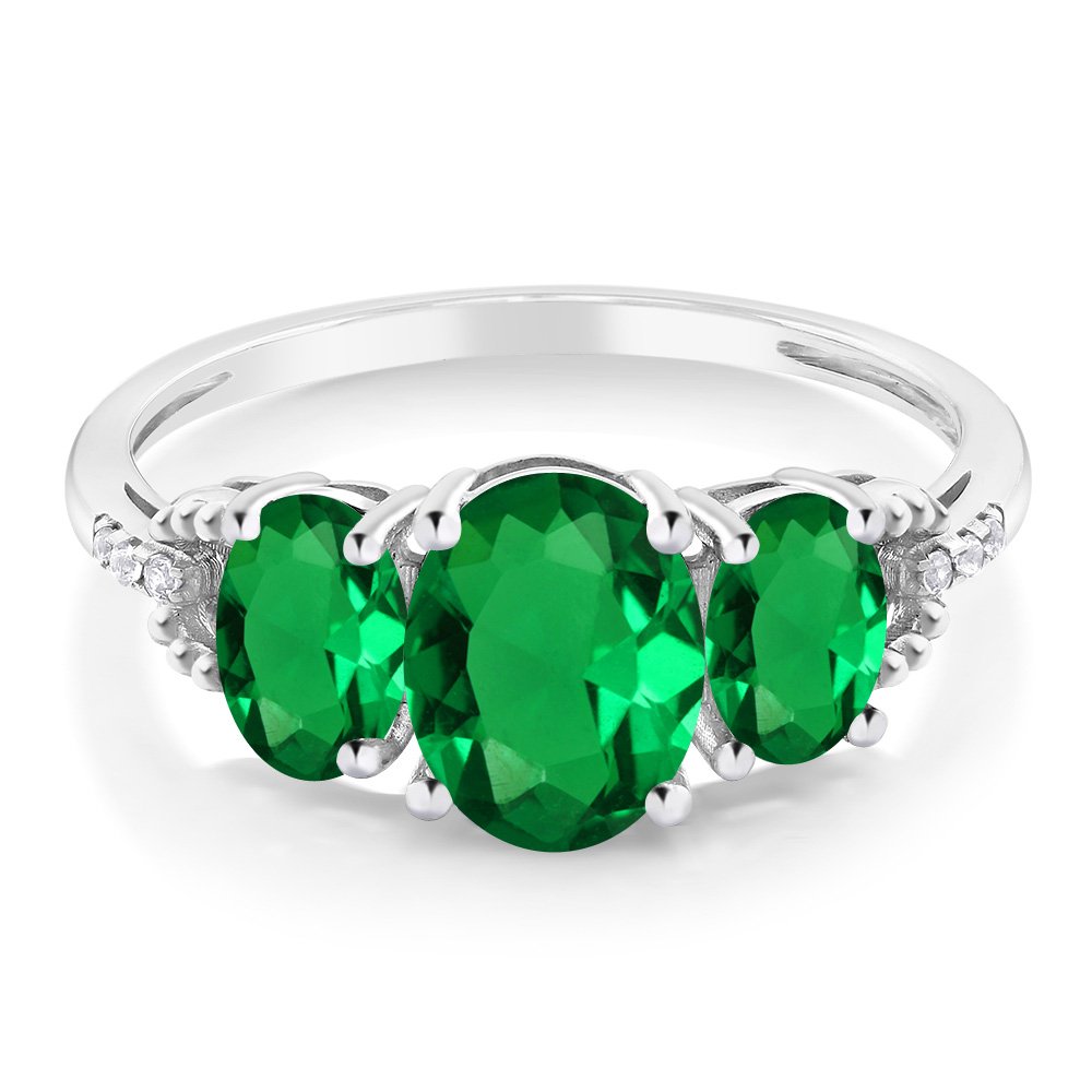 Gem Stone King 10K White Gold Green Simulated Emerald and Diamond Accent 3-Stone Engagement Ring For Women (1.85 Cttw) (Size 7)