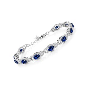 Gem Stone King 925 Sterling Silver Blue Created Sapphire Tennis Bracelet For Women (10.20 Cttw, Oval 6X4MM, 7 Inch With 1 Inch Extender)