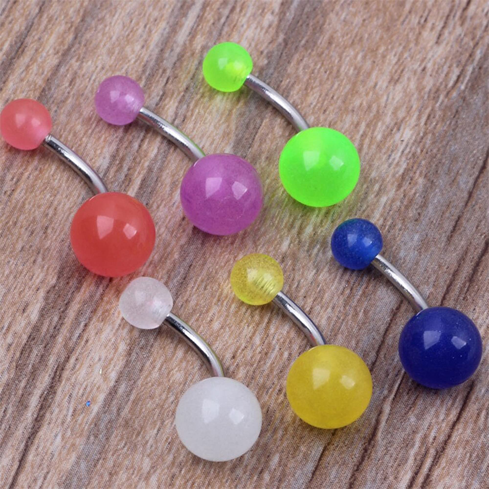 BodyJewelryOnline Belly Rings 14 Gauge Glow in The Dark Assortment 316L Surgical Steel Comfortable and Long Lasting Piercing Jewelry - Sold as a Pack of 16