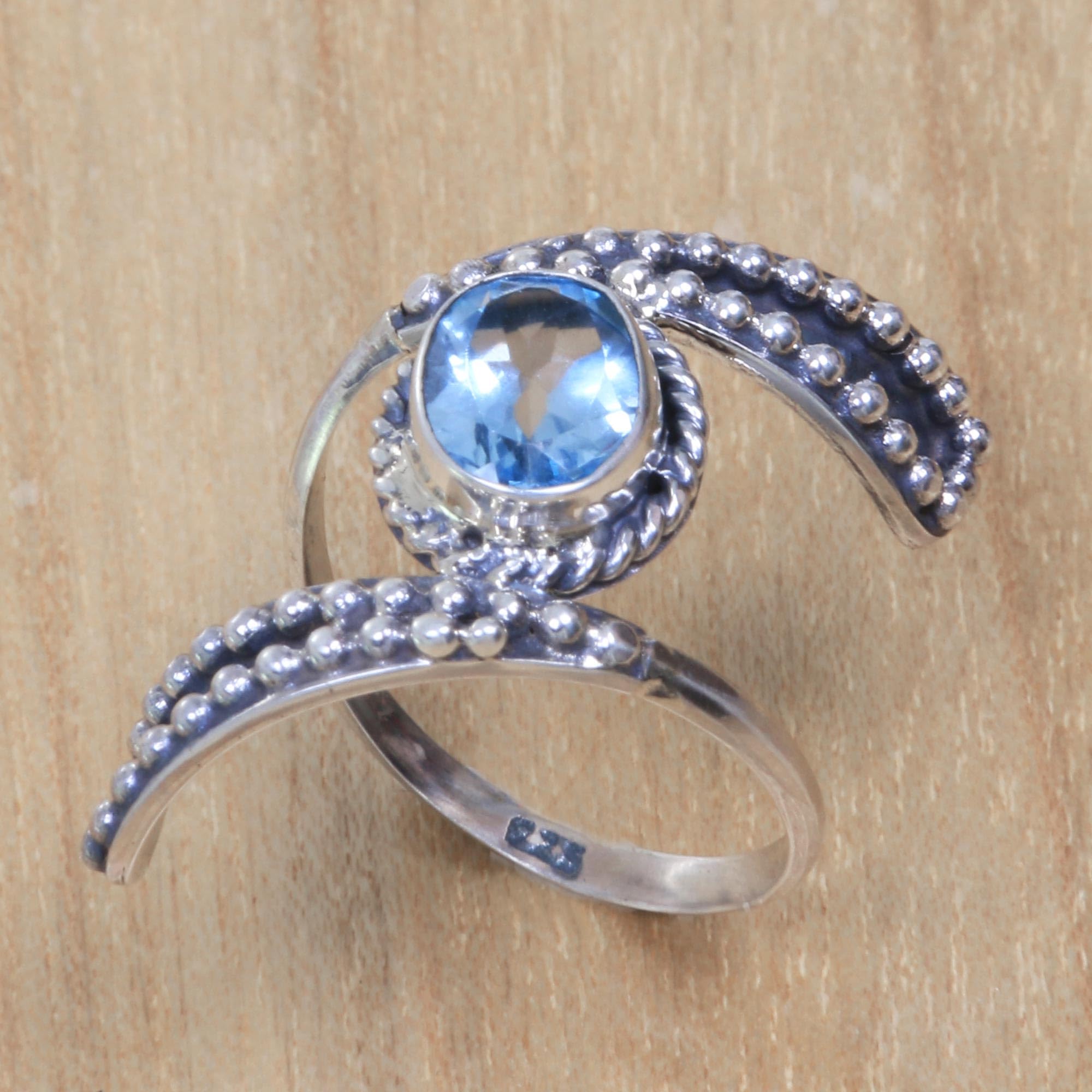 NOVICA Blue Topaz .925 Sterling Silver Cocktail Ring, 'Blue Melodies'