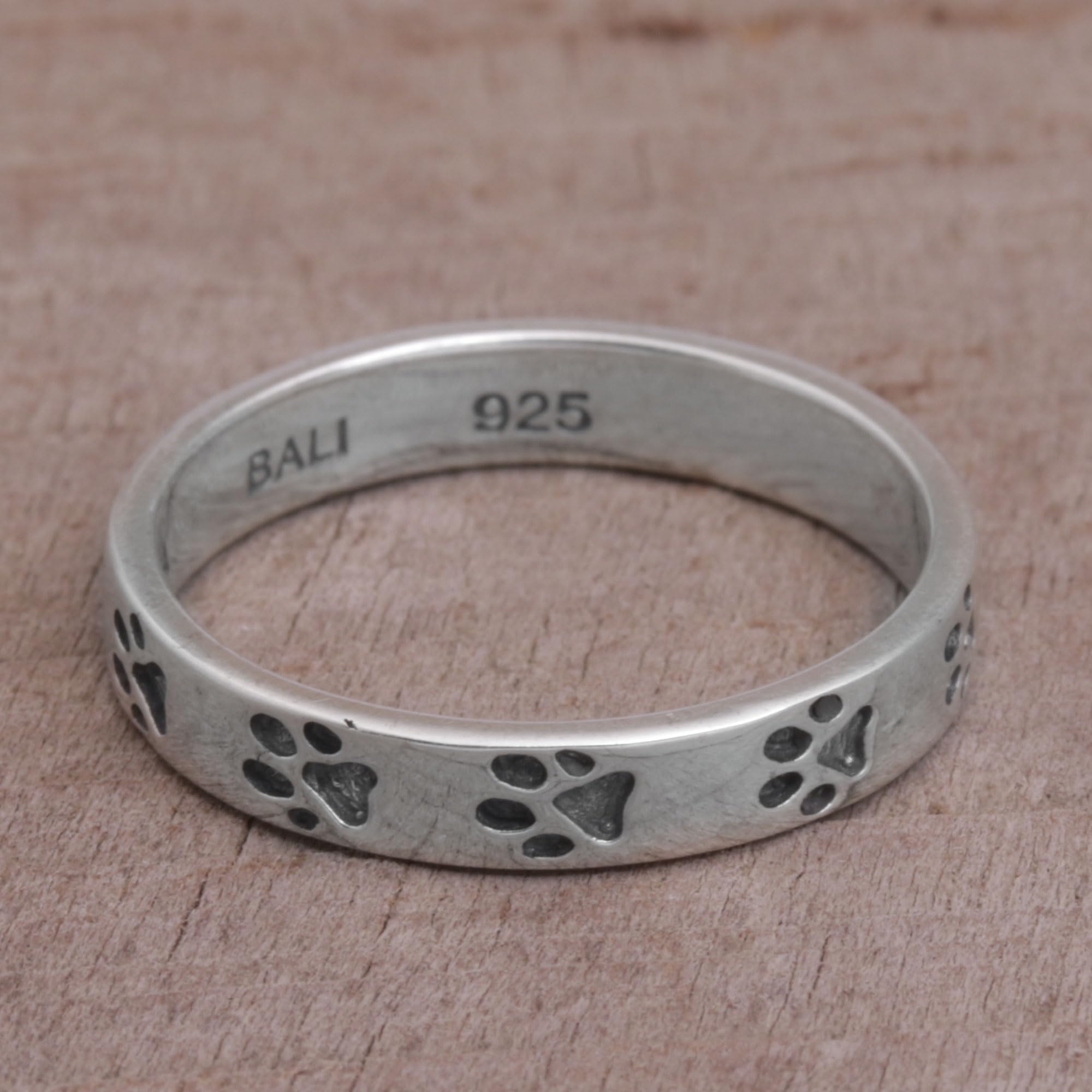 NOVICA Artisan Handmade Sterling Silver Band Ring Paw Print Motif from Bali No Stone Indonesia Animal Themed Modern Dog [band Width 4 mm W] ' Paw Prints'