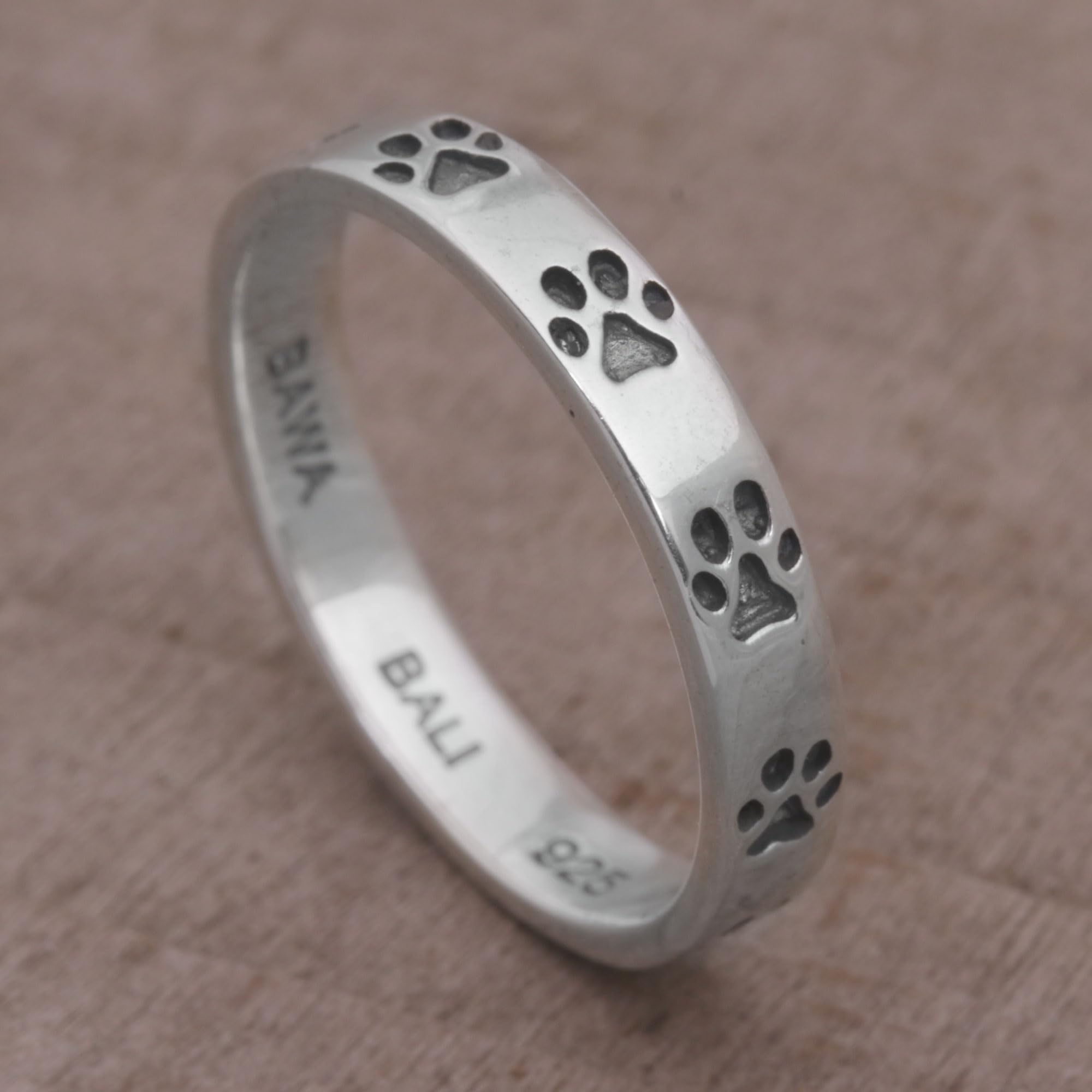 NOVICA Artisan Handmade Sterling Silver Band Ring Paw Print Motif from Bali No Stone Indonesia Animal Themed Modern Dog [band Width 4 mm W] ' Paw Prints'