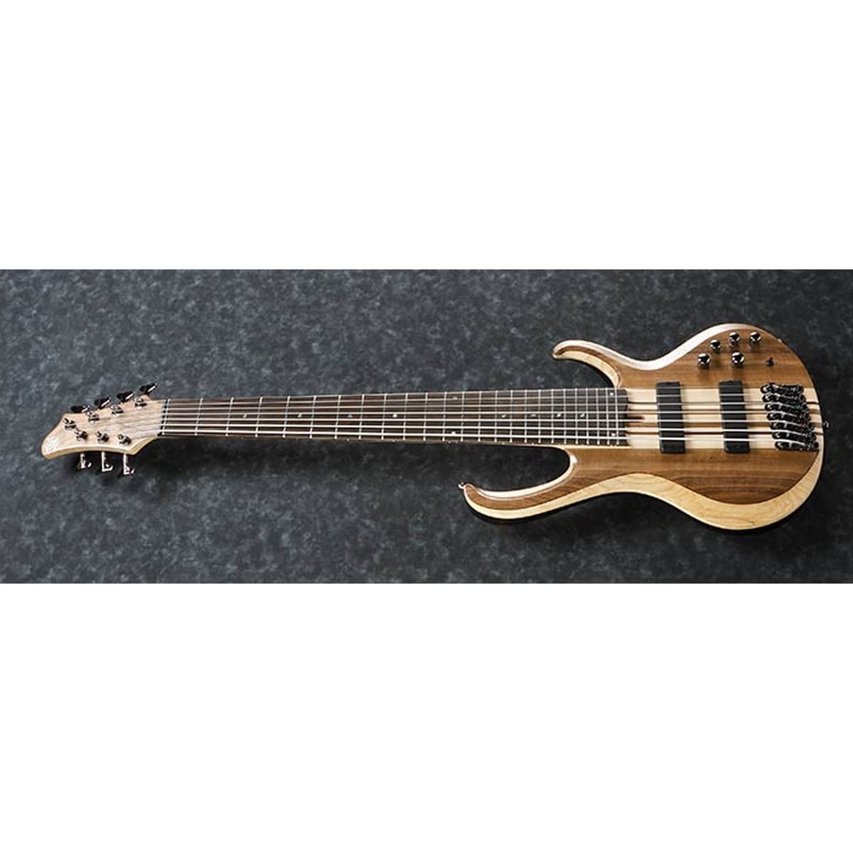 Ibanez BTB747 7 string Electric Bass Guitar with Mahogany-backed Ash Wings, Walnut Top2 Humbucking Pickups and 3-band Active EQ - Natural Flat Low Gloss