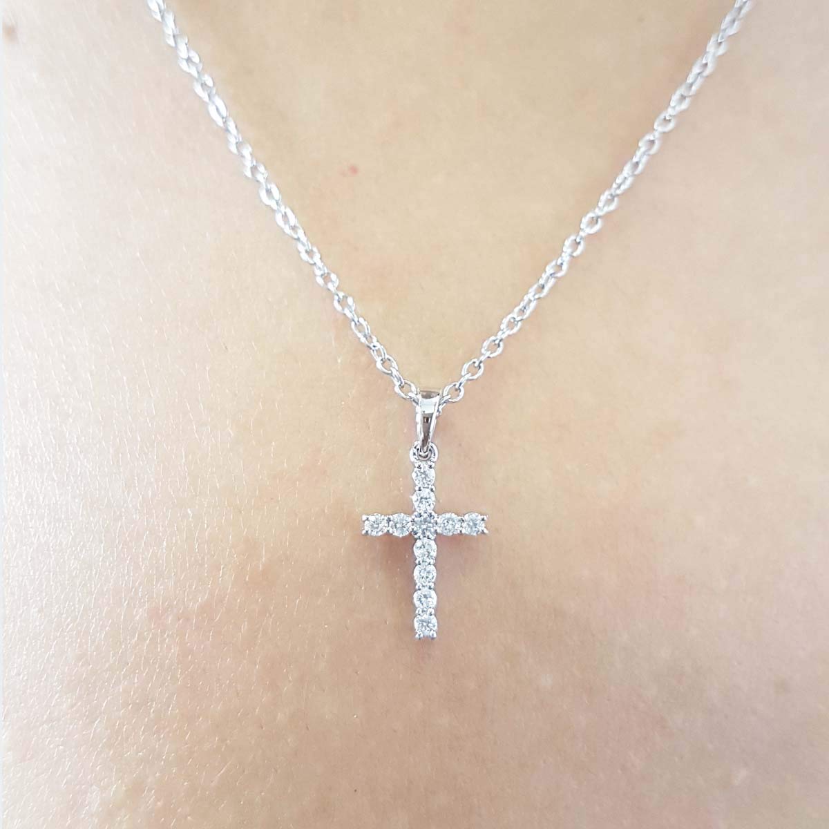 Dazzlingrock Collection Round White Diamond Classic Divine Cross of Jesus Pendant with 18 inch Silver Chain for Women (0.15 ctw, Color I-J, Clarity I2-I3) in 10K White Gold