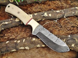 9.5 inches long skinning knife, hand forged damascus steel full tang trailing point blade, natural camel bone with brass bolster scale, cow hide leather sheath (camel bone)