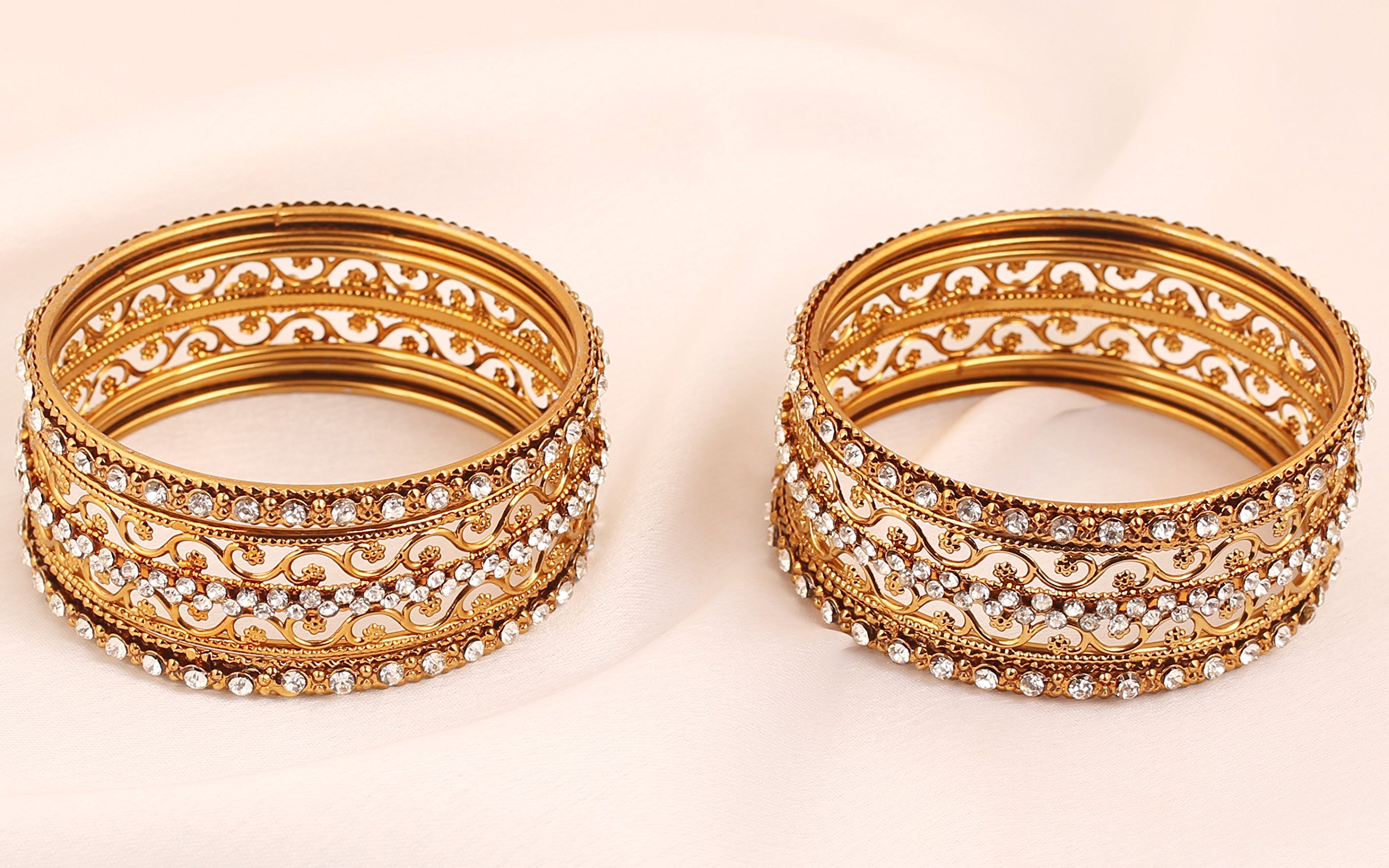 Touchstone "Golden Bangle Collection Exotic Filigree and Grain Work Clear Rhinestone Indian Bollywood Thick Thin Metal Bangle Bracelets in Antique Gold Tone for Women. Set of 6.