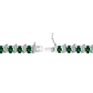 B. BRILLIANT Sterling Silver Simulated Emerald 6x4mm Oval and S Tennis Bracelet with White Topaz Accents