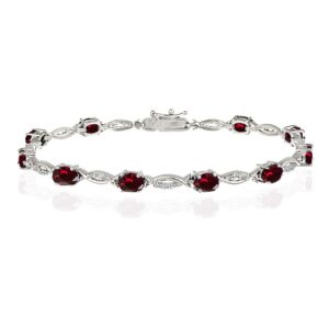 B. BRILLIANT Sterling Silver Synthetic Ruby and White Topaz Oval-Cut Swirl Tennis Bracelet