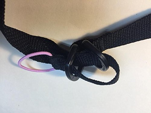 Carrier strap for single or multiple pairs of skis, poles, boots or snowboards