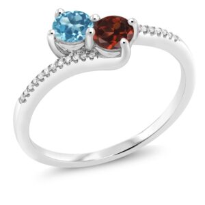 gem stone king 10k white gold forever united 2 stone swiss blue topaz and red garnet and diamond engagement ring for women (0.87 cttw, round, avaiable in size 5,6,7,8,9)