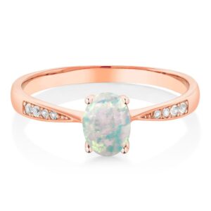 gem stone king 10k rose gold white opal and white diamond engagement ring for women (0.69 cttw, gemstone october birthstone, oval cabochon 7x5mm, available in size 5, 6, 7, 8, 9)