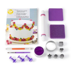 wilton how to decorate with fondant shapes and cut-outs kit - 14-piece cake decorating kit with 3 fondant cutouts, fondant shaping set, roller, dusting pouch, 6 cutters, video tutorial