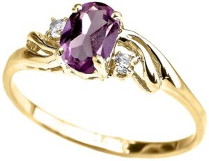 10k yellow gold oval shaped purple cubic zirconia with round white topaz 3-stone swirl ring - size 10-1/2