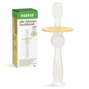 haakaa 360° baby toothbrush with suction base - gentle cleaning for infant self-brushing training, food-grade silicone, adjustable safety shield - translucent (1 piece)