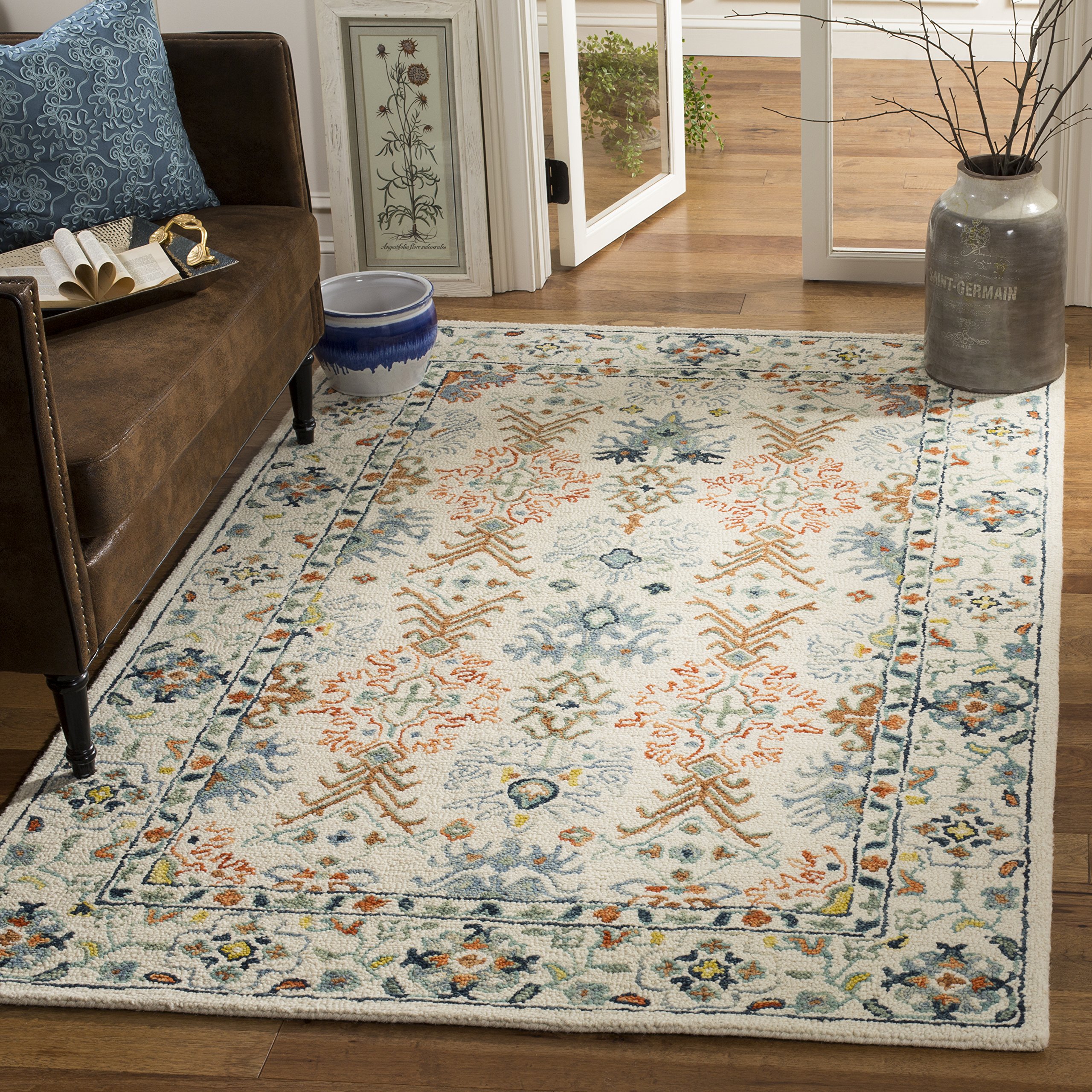 SAFAVIEH Aspen Collection Area Rug - 6' x 9', Ivory & Blue, Handmade Boho Wool, Ideal for High Traffic Areas in Living Room, Bedroom (APN310A)