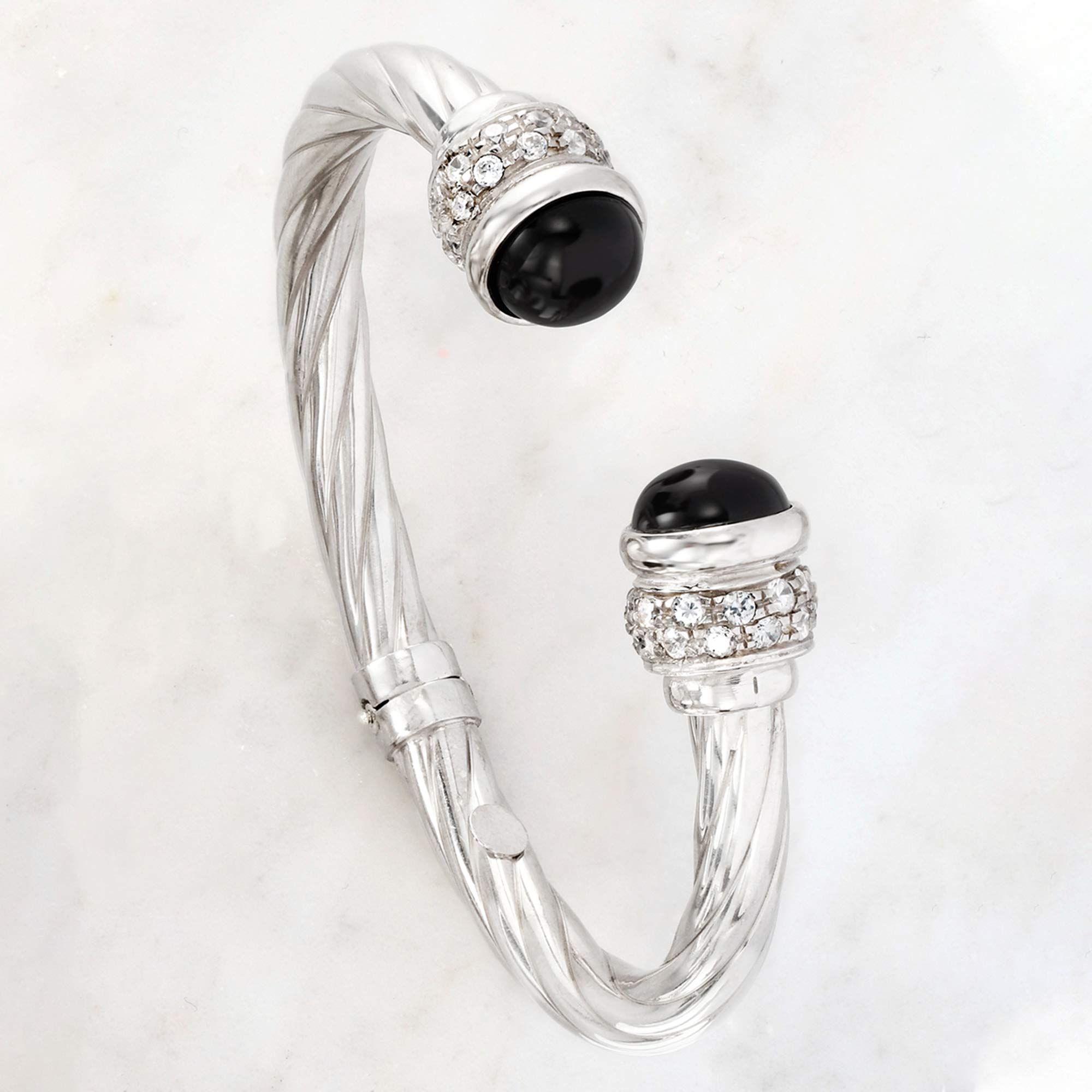 Ross-Simons Italian Black Onyx and 1.30 ct. t.w. CZ Twisted Cuff Bracelet in Sterling Silver. 7 inches