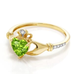 Gem Stone King 10K Yellow Gold Green Peridot and Diamond Accent Irish Celtic Claddagh Ring For Women (0.89 Cttw, Heart Shape 6MM, Available in size 5, 6, 7, 8, 9)