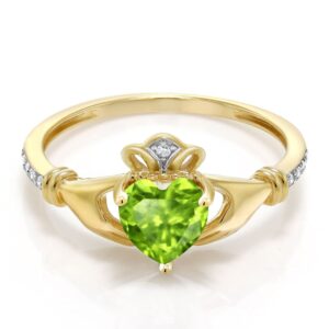 Gem Stone King 10K Yellow Gold Green Peridot and Diamond Accent Irish Celtic Claddagh Ring For Women (0.89 Cttw, Heart Shape 6MM, Available in size 5, 6, 7, 8, 9)