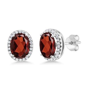 gem stone king 925 sterling silver red garnet halo earrings for women (4.08 cttw, gemstone birthstone, oval 9x7mm)