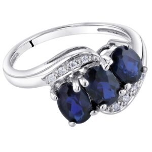 PEORA Created Blue Sapphire and Genuine Diamond Three Stone Anniversary Ring for Women 14K White Gold, 1.50 Carats total Oval Shape, Size 6