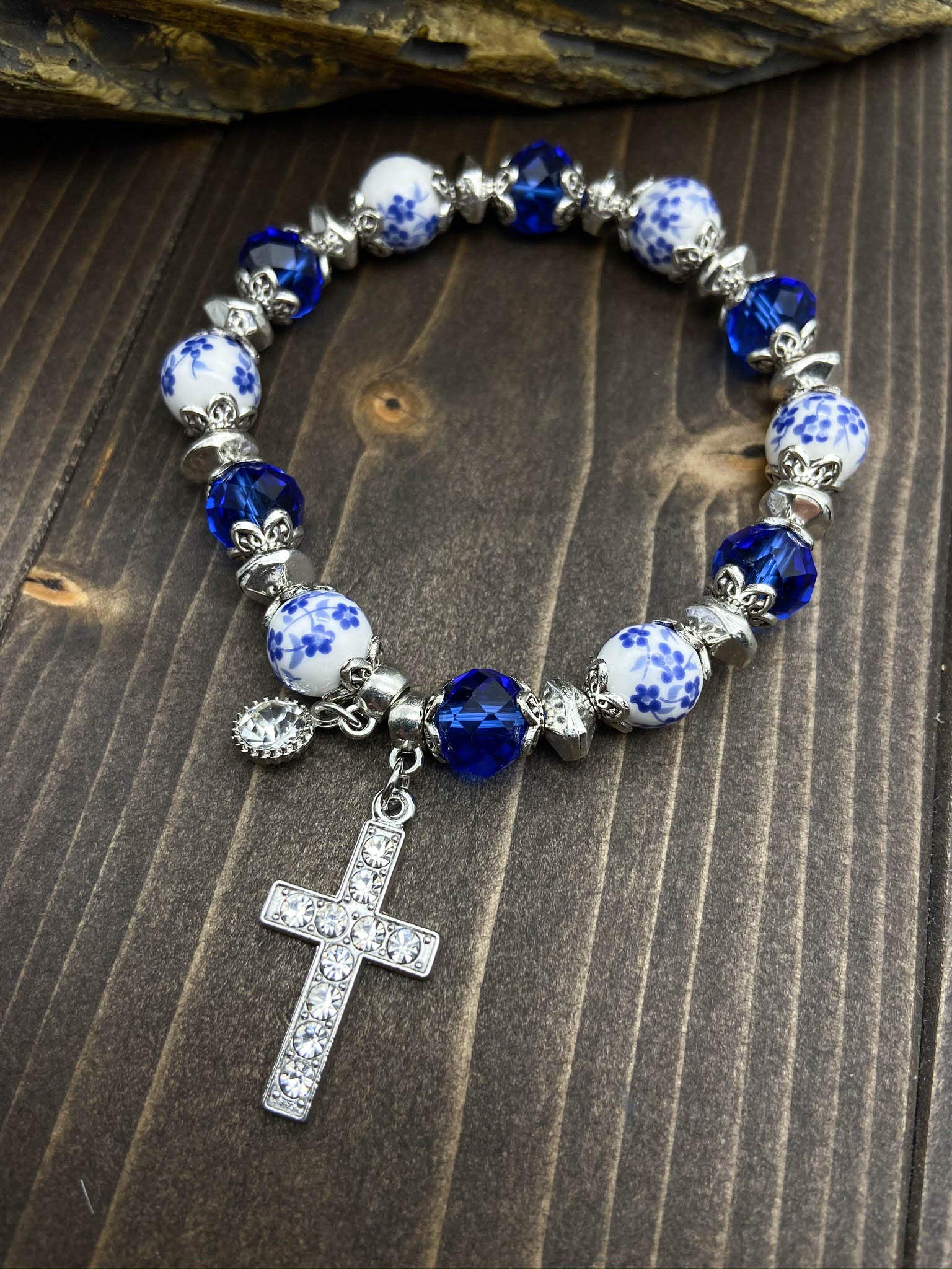 Nazareth Store Handmade Crystallized Glass Beads Cross Bracelet with Ceramic Flower Beads Religious Christian Bangle for Women and Men (Blue)