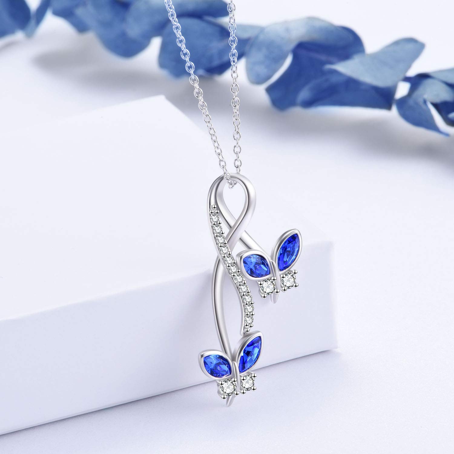 AOBOCO Sterling Silver Infinity Butterfly Necklace, Butterfly Pendant Made with Simulated Sapphire Birthstone Crystal from Austria, Birthday Anniversary Jewelry Gifts for Women(Blue)