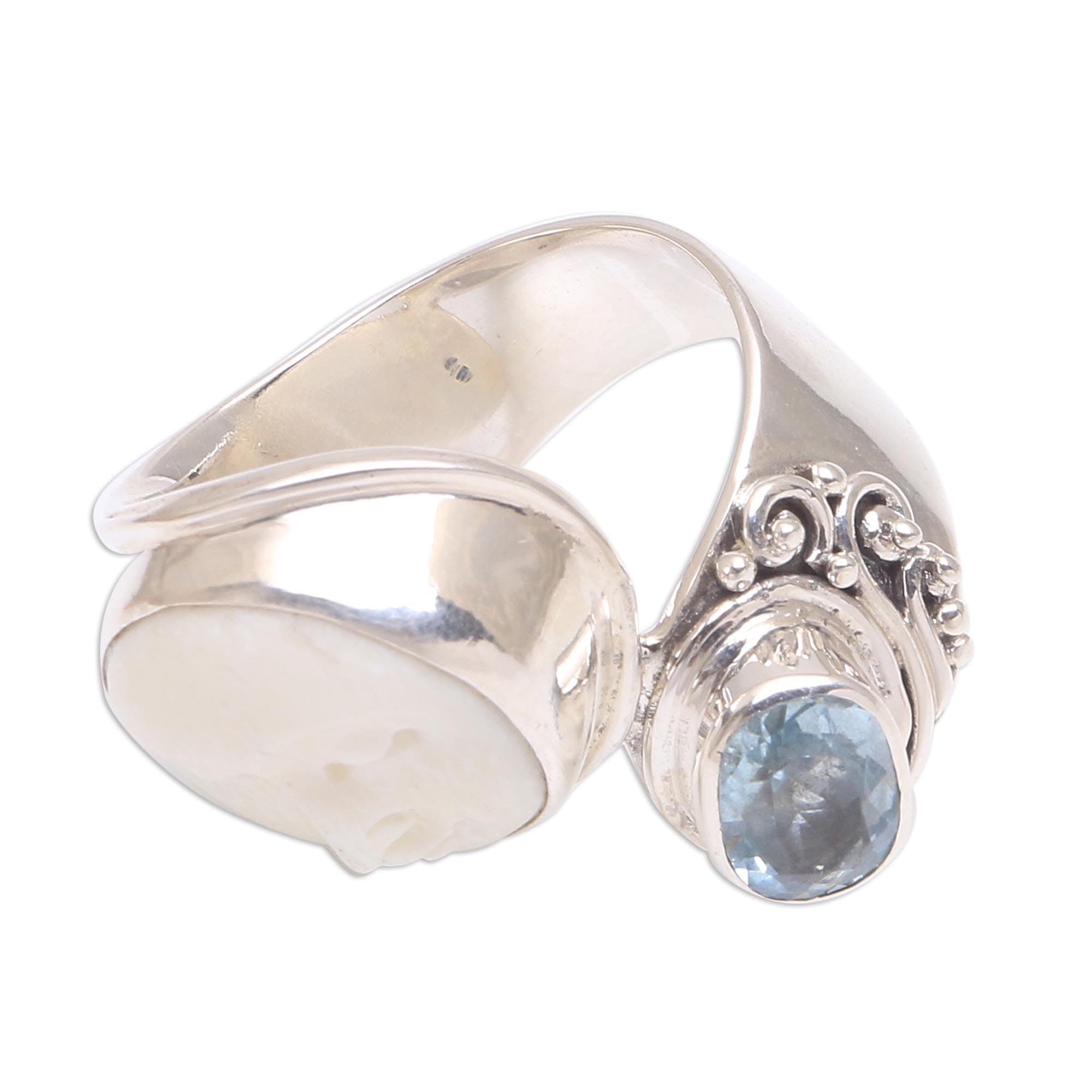 NOVICA Artisan Handmade Blue Topaz Cocktail Ring Bone Face from Bali Sterling Silver Indonesia Birthstone Gemstone [ring Front 0.6 in L x 0.6 in W x 0.3 in H Band Width 7 mm W] ' Sparkling Face'