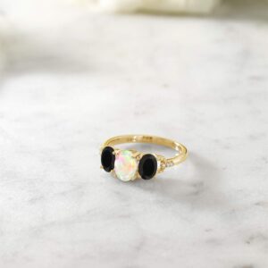 Gem Stone King 10K Yellow Gold Oval White Ethiopian Opal and Black Onyx 3-Stone Engagement Ring For Women (1.30 Cttw, Gemstone Birthstone, Available In Size 5, 6, 7, 8, 9)