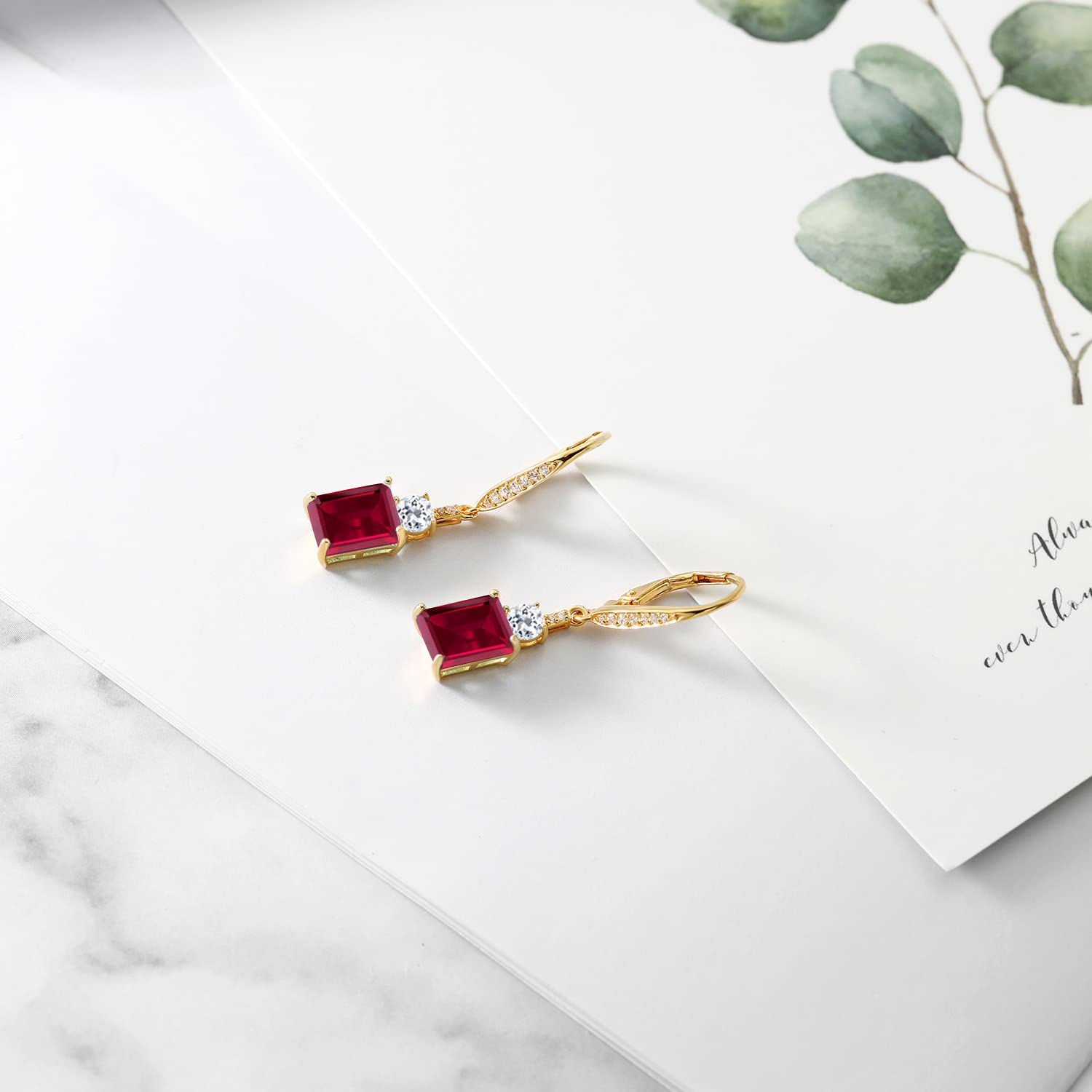 Gem Stone King 18K Yellow Gold Plated Silver Red Created Ruby and White Topaz Dangle Earrings For Women (6.26 Cttw, Gemstone July Birthstone, Emerald Cut 9X7MM)