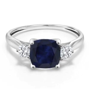 gem stone king 10k white gold blue sapphire and white moissanite 3-stone engagement ring | 2.26 cttw | cushion 7mm | 3 stone wedding anniversary promise gold ring for women (size 7)