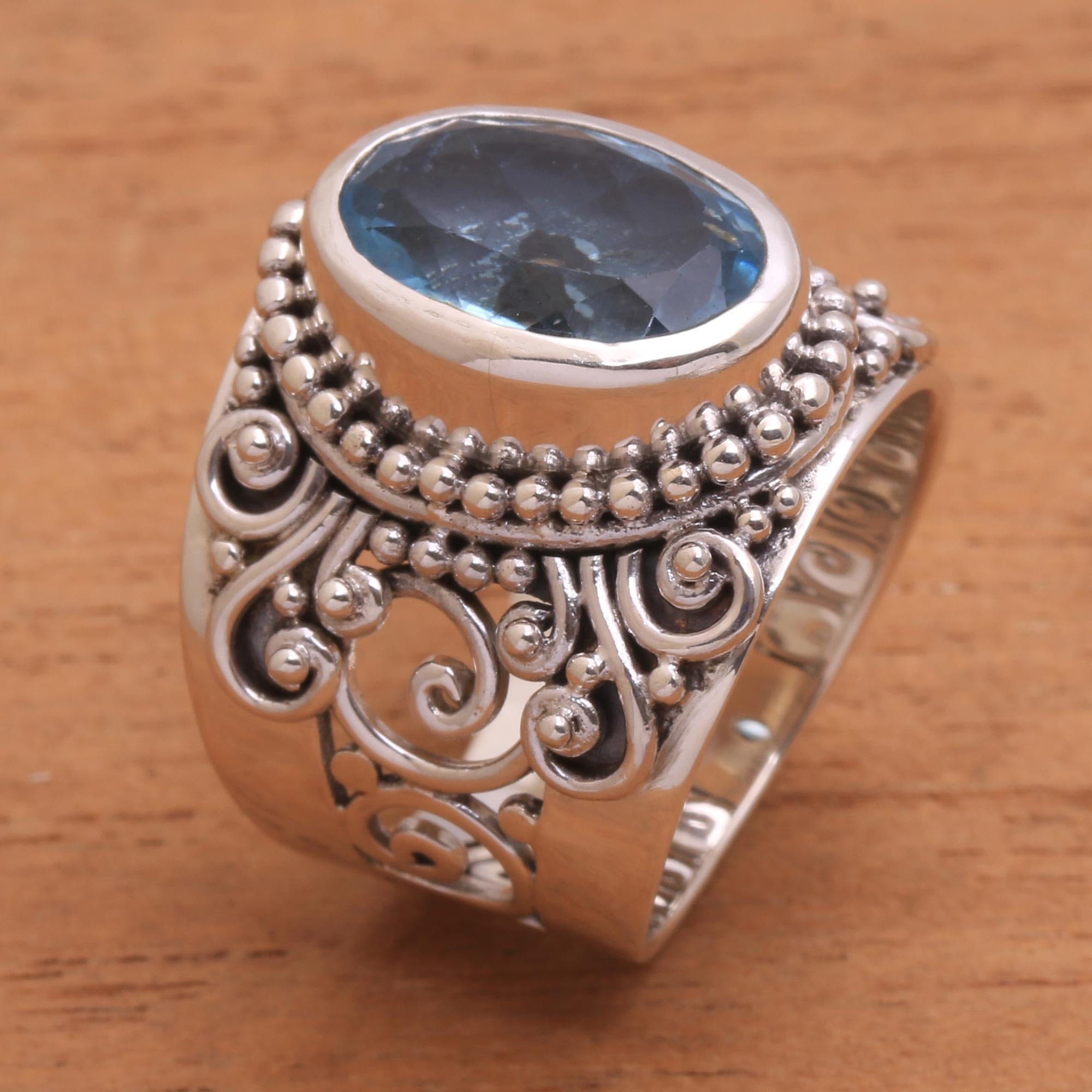 NOVICA Artisan Handmade Blue Topaz Single Stone Ring Sterling Silver from Bali Cocktail Indonesia Gemstone Birthstone [crownbezel 0.7 in H x 0.6 in W x 0.3 in D Band Width 8 mm W] ' Glorious Vines'