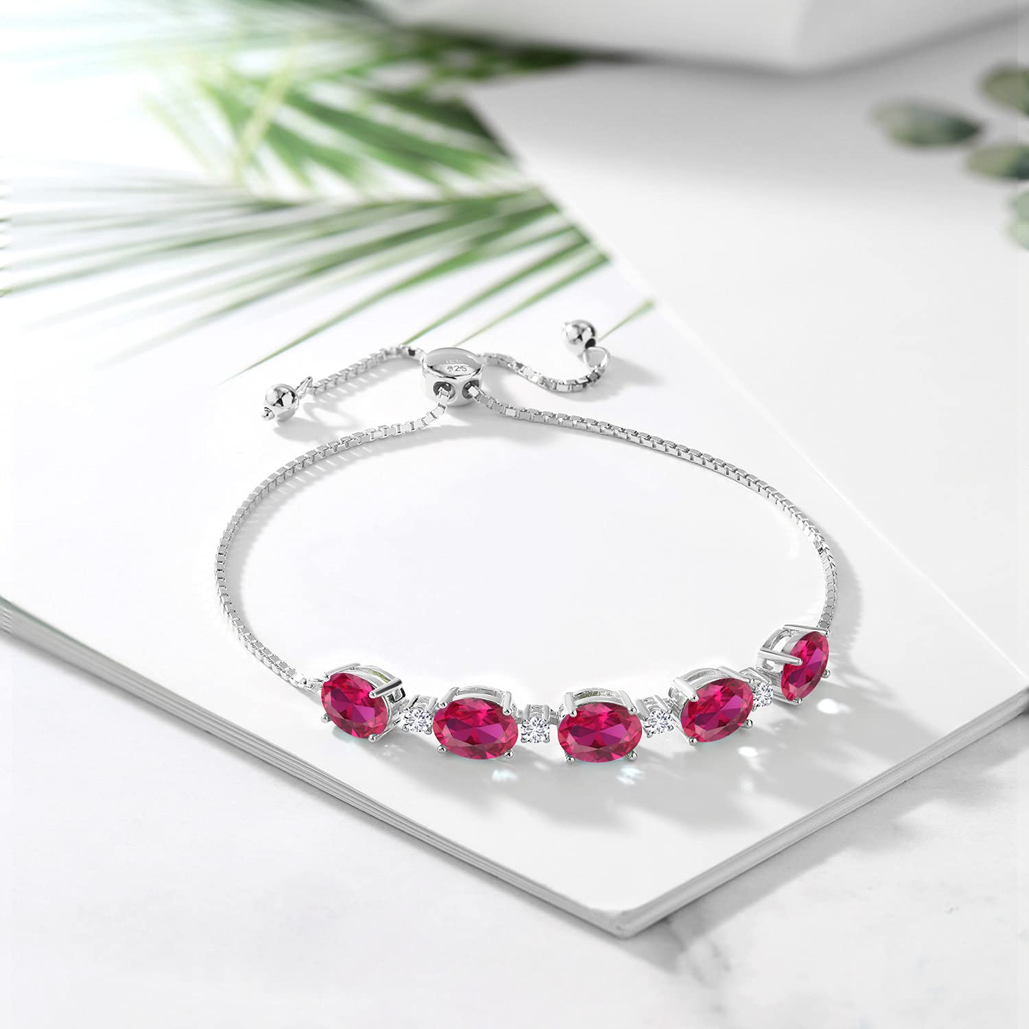 Gem Stone King 925 Sterling Silver Red Created Ruby and White Lab Grown Diamond Tennis Bracelet For Women (7.76 Cttw, Oval Center Stone:8X6MM, Small Stones: 2.5MM)