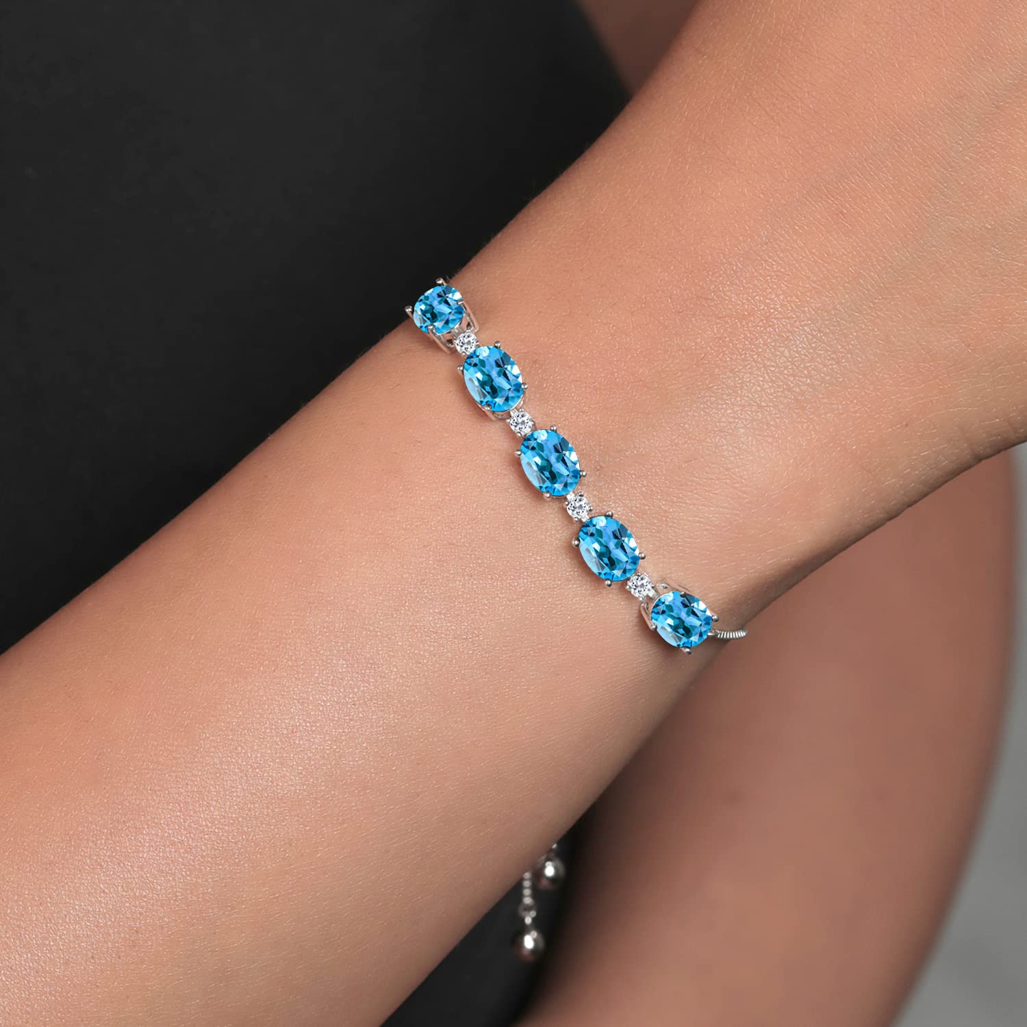 Gem Stone King 925 Sterling Silver Swiss Blue Topaz and White Topaz Tennis Bracelet For Women (7.84 Cttw, Center Stone: 8X6MM, Small Stones: 2.5MM, Gemstone Birthstone, Fully Adjustable Up to 9 Inch)