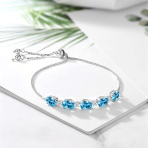 Gem Stone King 925 Sterling Silver Swiss Blue Topaz and White Topaz Tennis Bracelet For Women (7.84 Cttw, Center Stone: 8X6MM, Small Stones: 2.5MM, Gemstone Birthstone, Fully Adjustable Up to 9 Inch)